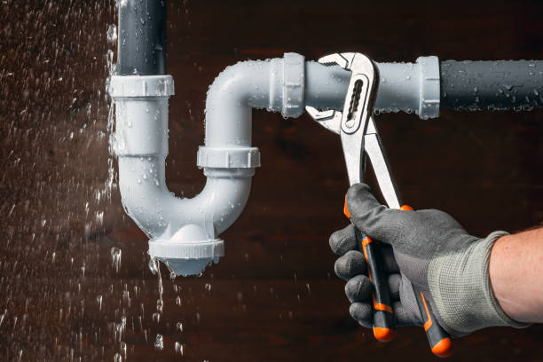 Professional Plumbing technician working in Marengo, IA
